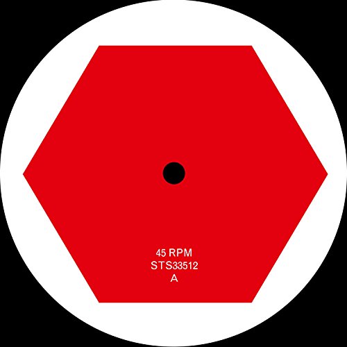 Red hexagonal vinyl record label with central hole and text details.