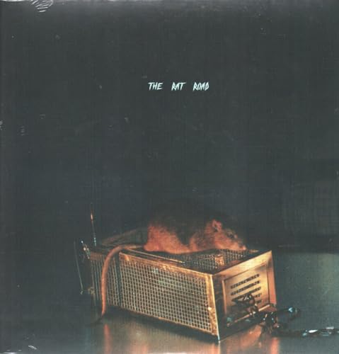 Vinyl record cover: dark image of a rat in a wire cage.