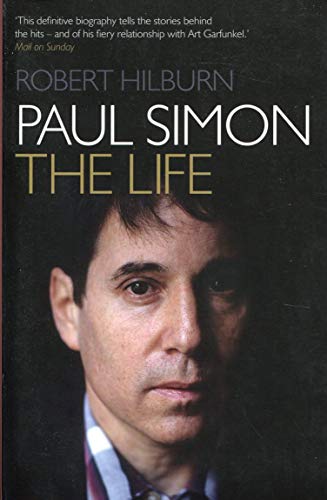 Book cover: "Paul Simon: The Life" featuring a portrait of Paul Simon.