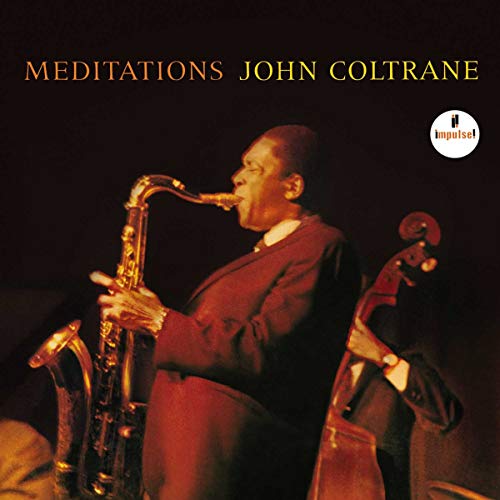 John Coltrane playing saxophone on the cover of the Meditations album.