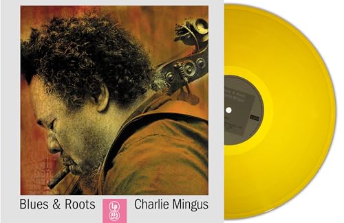 Album cover featuring Charlie Mingus with a double bass and orange vinyl record.
