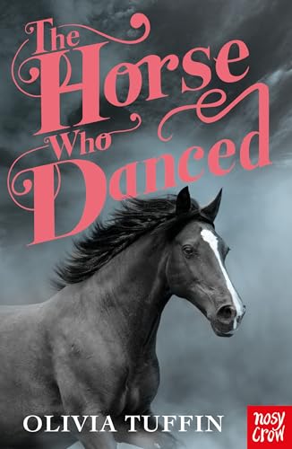 A black horse with a white blaze runs against a dark, cloudy sky.