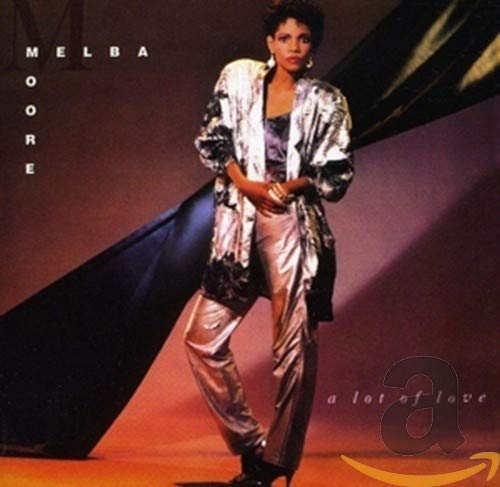 Melba Moore album cover, portrait of singer in silver clothing.