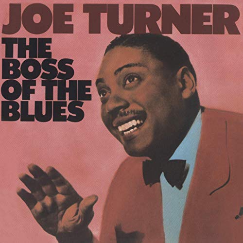 Joe Turner album cover, portrait of a smiling man in a suit.