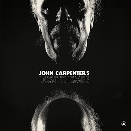 Black and white album cover featuring a distorted face and text.