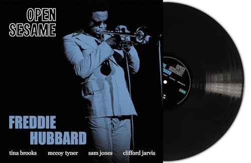Freddie Hubbard’s “Open Sesame” vinyl record with trumpet player portrait.