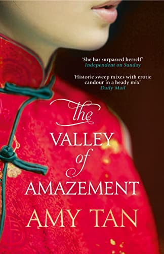 Book cover for “The Valley of Amazement” by Amy Tan, red dress detail.