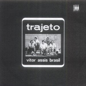 Black and white CD cover featuring a group of men seated outdoors.