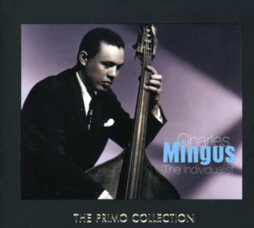 Charles Mingus with upright bass on CD cover, portrait view.