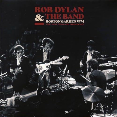 Bob Dylan and The Band performing live on stage in 1974.