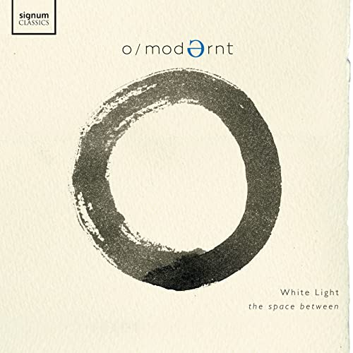CD cover with a black, brushed circle on a white background.
