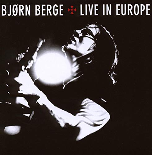 CD cover: Björn Berge performing live with a microphone, black and white.