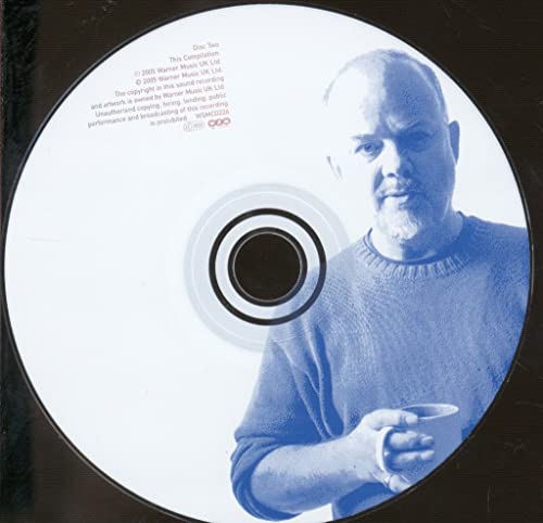 CD with a portrait of John Peel holding a mug, light blue tint.