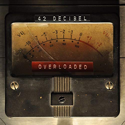 CD cover with a vintage VU meter reading “Overloaded” in red.