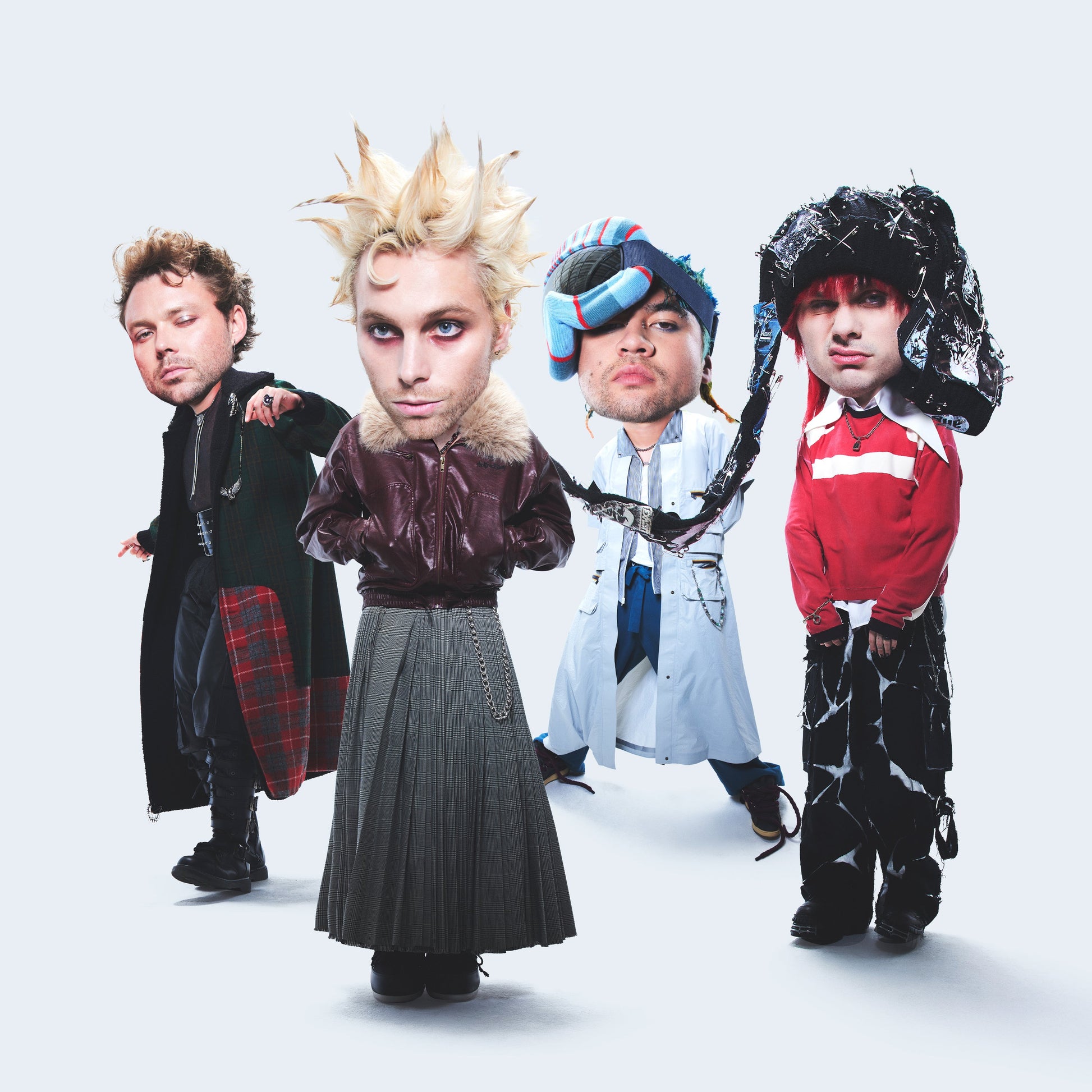 Four men with oversized heads wearing eclectic, avant-garde fashion against a white background.