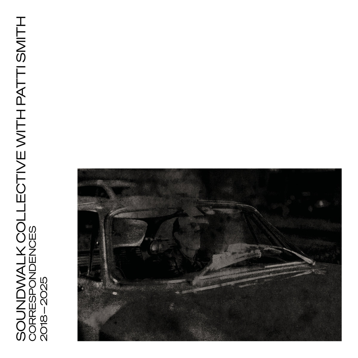 Vinyl record cover: black and white image of a person in a car.