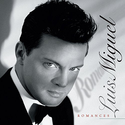 Black and white portrait of Miguel, album cover for "Romances.