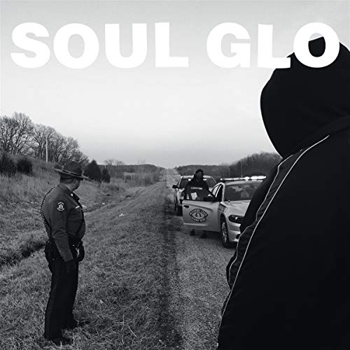 Black and white album cover depicting a police encounter roadside.
