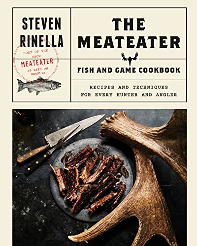 Outdoor cookbook with game and fish recipes, likely featuring rustic hunting and fishing imagery.