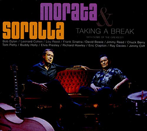 CD cover featuring two men seated near a red armchair and instruments.