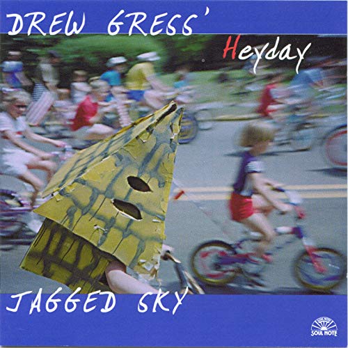 Album cover for "Jagged Sky" featuring blurred figures and a cardboard cutout.