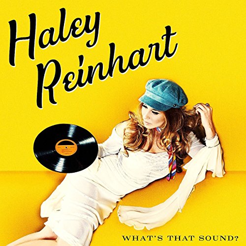 CD cover: woman with record, yellow background, "Reinhart Haley" text.