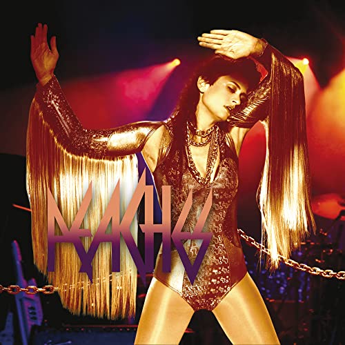 Peaches album cover: performer in gold fringe, purple text overlay.