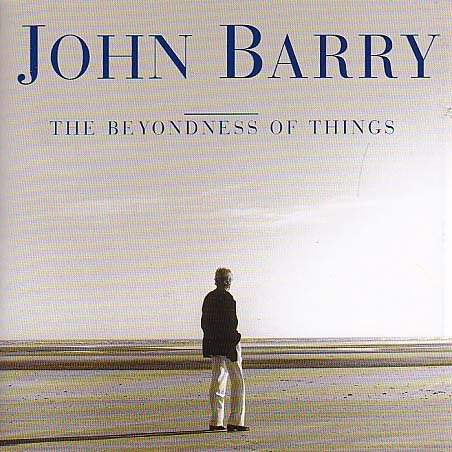 CD cover for "The Beyondness of Things" featuring a lone figure on a beach.