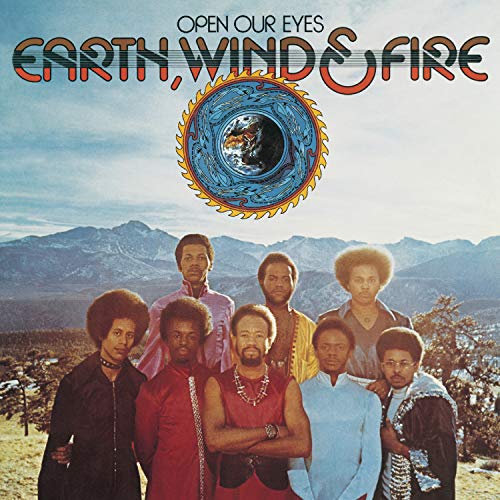 Earth, Wind & Fire album cover with band members and mountain backdrop.