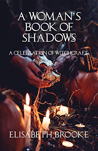 Book cover with skull, hand, pumpkins, and lit candles, dark aesthetic.