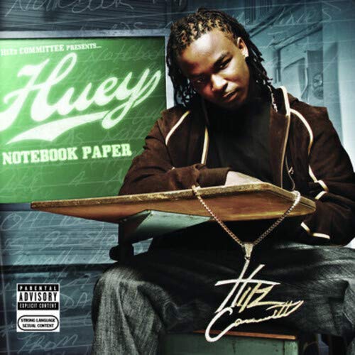 Huey album cover: rapper seated with notebook, green chalkboard background.