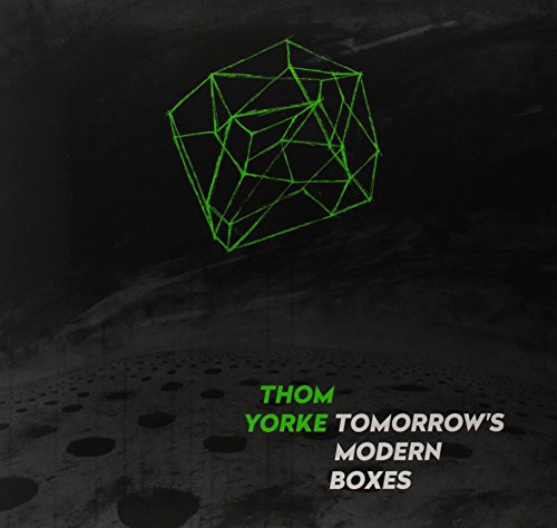 Album cover: green wireframe cube on dark, textured background.