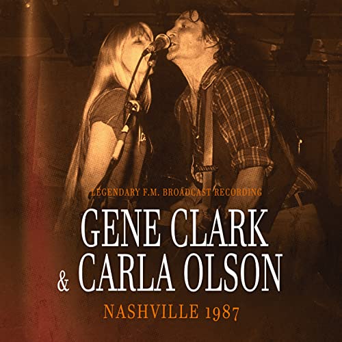 Gene Clark and Carla Olson performing with microphones on stage, 1987.