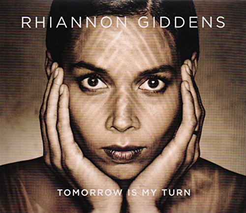 Close-up portrait of Rhiannon Giddens on the album cover “Tomorrow Is My Turn.”