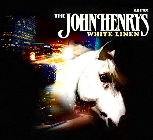 CD cover: white horse superimposed on a city skyline at night.