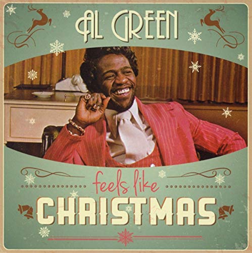 Al Green album cover, "Feels Like Christmas," with reindeer and snowflakes.