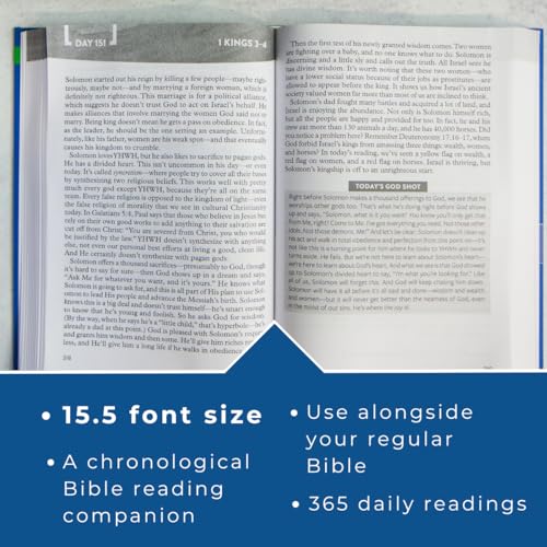 Open Bible with highlighted text and a blue cover detail.