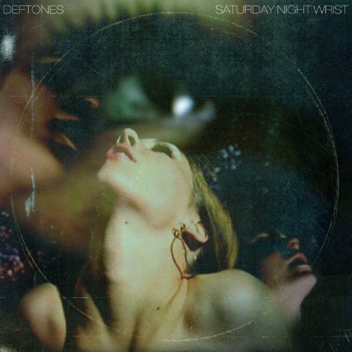 Deftones “Saturday Night Wrist” album cover: distorted image of a person looking up.