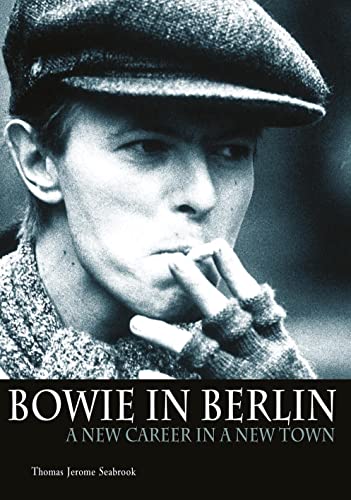 David Bowie in a cap, smoking, book cover titled “Bowie in Berlin”.