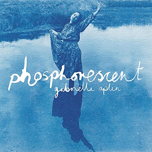 Blue-toned album cover of Gabrielle Aplin standing in water with cursive white text.