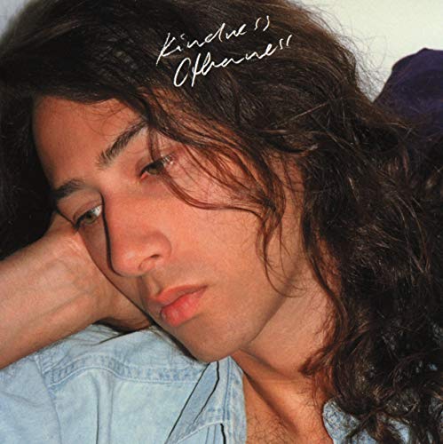 CD cover featuring a close-up portrait of a person with long hair.
