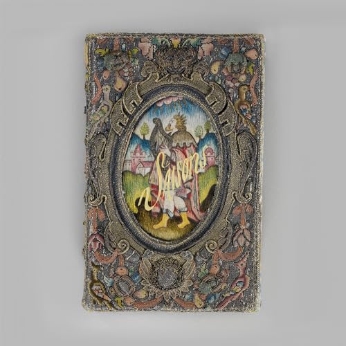 Ornate CD case with a painted figure and floral embellishments.