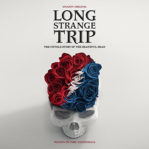 Skull adorned with red and blue roses, Grateful Dead’s “Long Strange Trip” album cover.