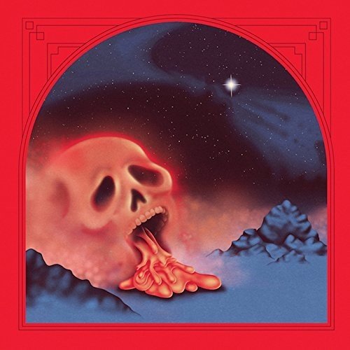 Red album cover with a skull engulfed in a starry, dark landscape.