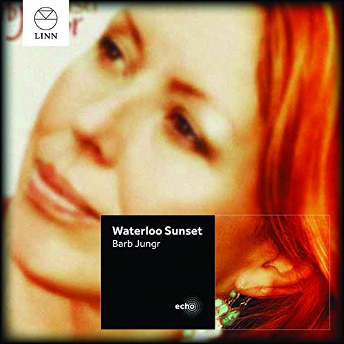 CD cover featuring a close-up portrait of a woman with red hair.