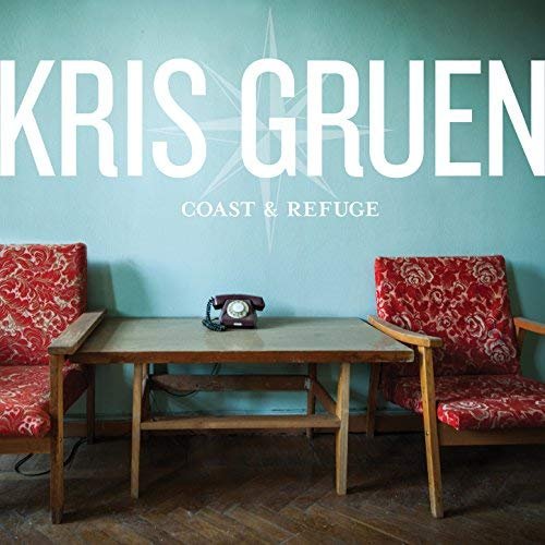 CD cover: two chairs, a table with a vintage telephone, blue wall.