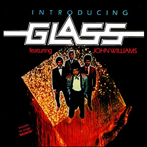 Album cover for "Glass" featuring John Williams and three men in suits.