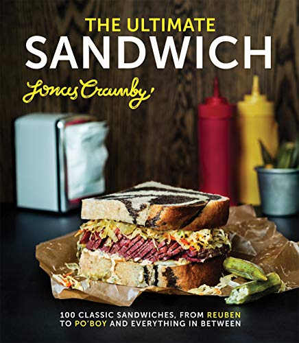 Cookbook cover featuring a stacked Reuben sandwich and diner condiments.
