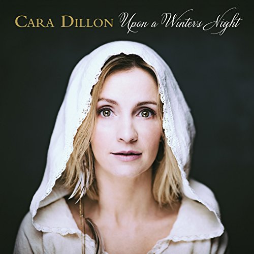 Cara Dillon album cover: woman in white head covering, dark background.