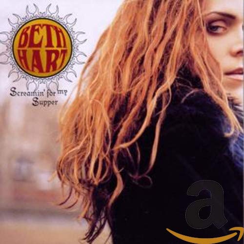 CD cover featuring Beth Hart with long red hair and a yellow sunburst.